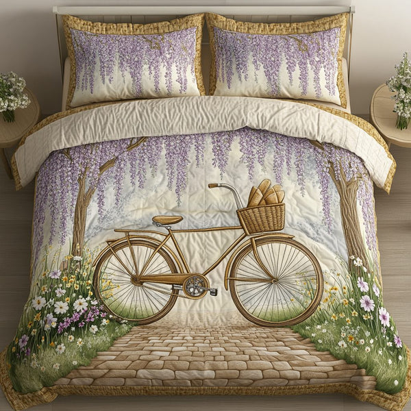Garden Cruiser quilted 3-piece bedding set on a made bed with two matching pillow shams