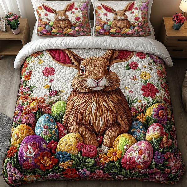 Garden Delight quilted 3-piece bedding set on a made bed with two matching pillow shams