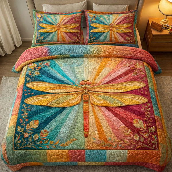 Garden Dragonfly quilted 3-piece bedding set on a made bed with two matching pillow shams