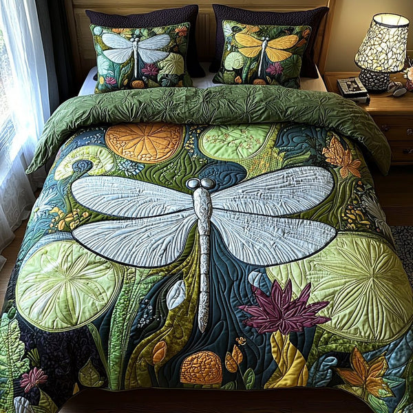 Garden Dragonfly quilted 3-piece bedding set on a made bed with two matching pillow shams