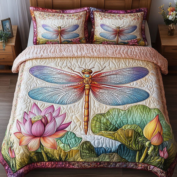 Garden Dragonfly quilted 3-piece bedding set on a made bed with two matching pillow shams