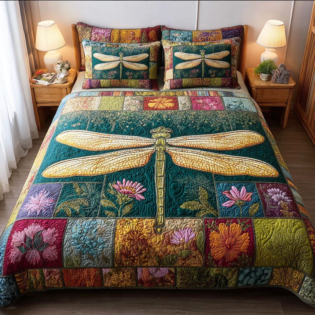 Garden Dragonfly quilted 3-piece bedding set on a made bed with two matching pillow shams