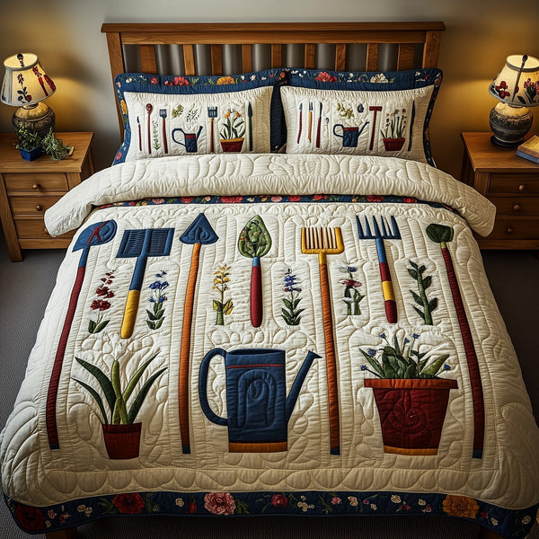 Garden Dreamer quilted 3-piece bedding set on a made bed with two matching pillow shams