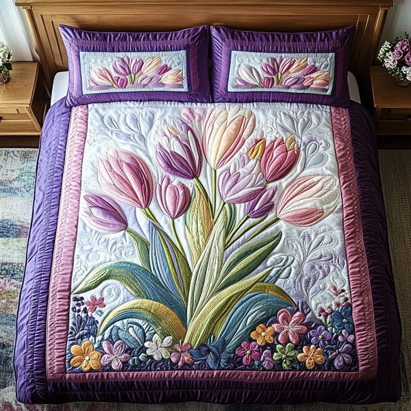 Garden Dreams quilted 3-piece bedding set on a made bed with two matching pillow shams