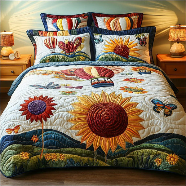 Garden Flight Dreams quilted 3-piece bedding set on a made bed with two matching pillow shams