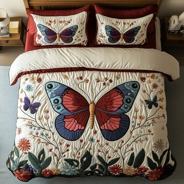 Garden Flight quilted 3-piece bedding set on a made bed with two matching pillow shams