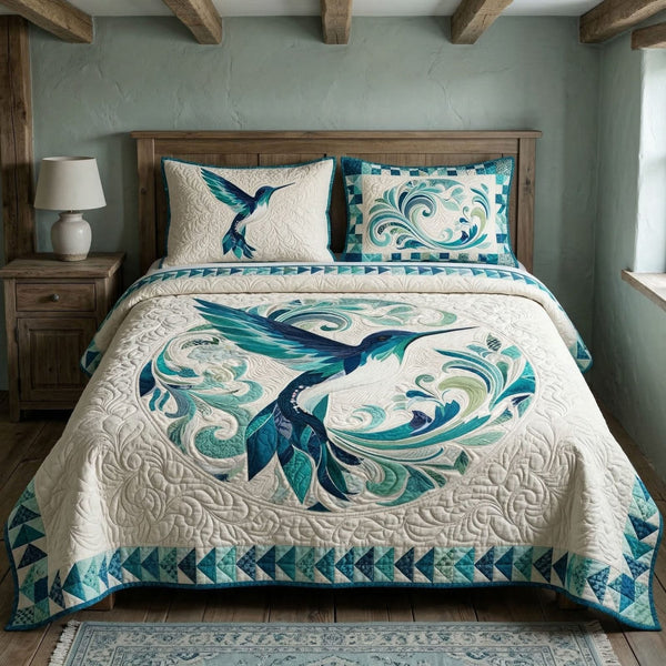 Garden Flight quilted 3-piece bedding set on a made bed with two matching pillow shams