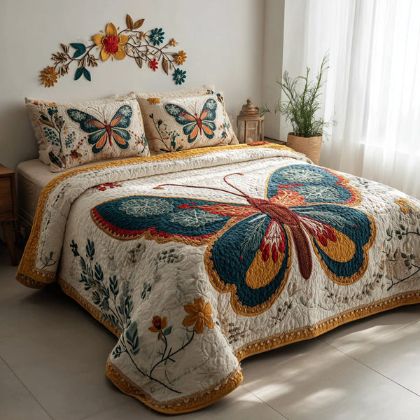 Garden Flutter quilted 3-piece bedding set on a made bed with two matching pillow shams