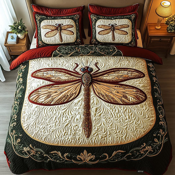 Garden Glider quilted 3-piece bedding set on a made bed with two matching pillow shams