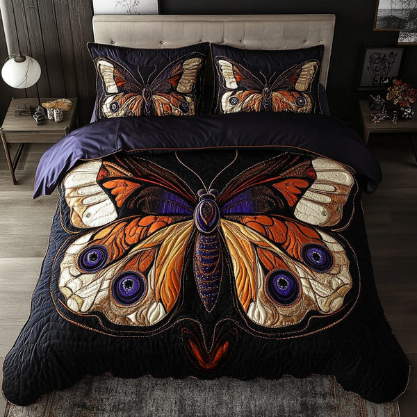 Garden Glider quilted 3-piece bedding set on a made bed with two matching pillow shams
