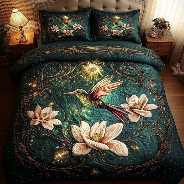 Garden Glimmer quilted 3-piece bedding set on a made bed with two matching pillow shams