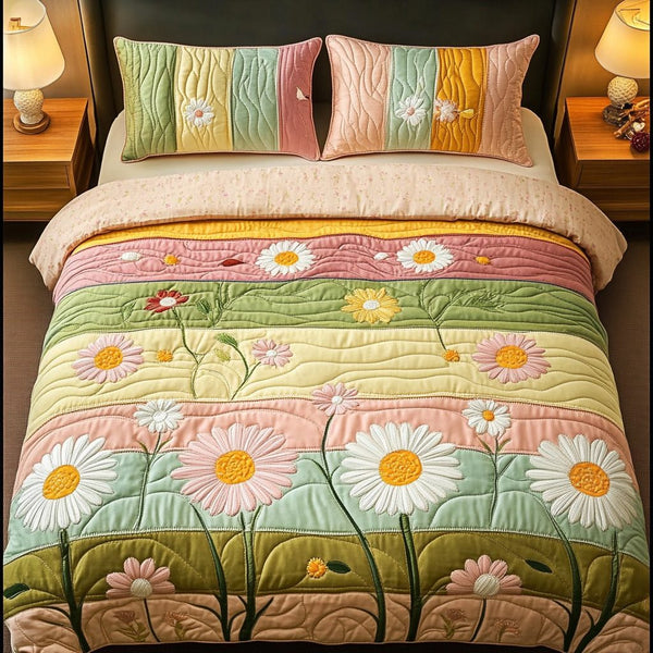 Garden Glow quilted 3-piece bedding set on a made bed with two matching pillow shams