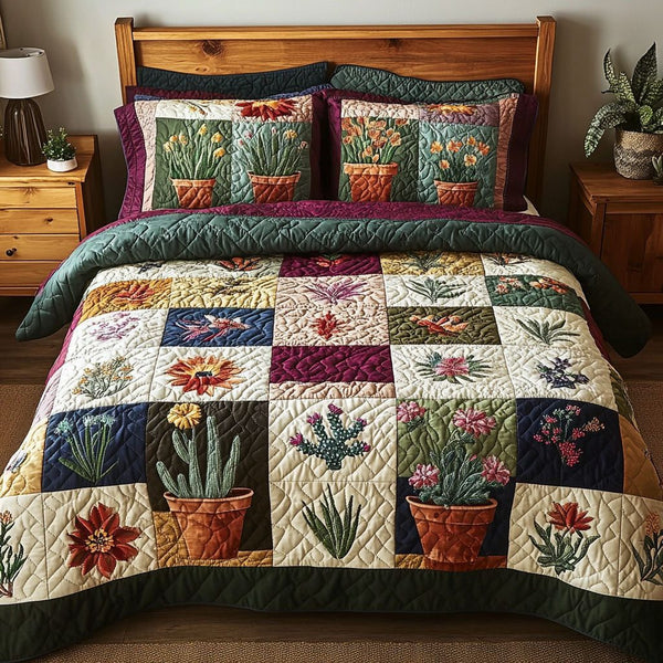 Garden Glow quilted 3-piece bedding set on a made bed with two matching pillow shams