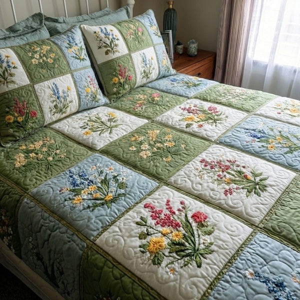 Garden Harmony quilted 3-piece bedding set on a made bed with two matching pillow shams