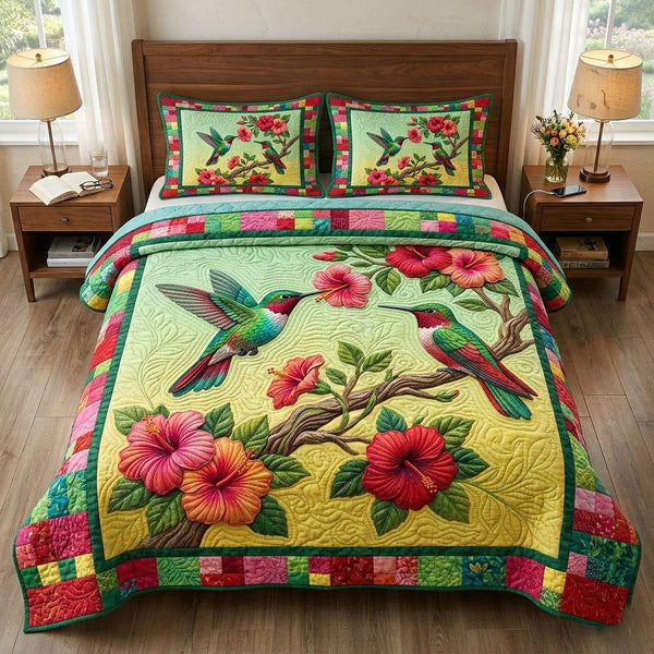 Garden Hover quilted 3-piece bedding set on a made bed with two matching pillow shams