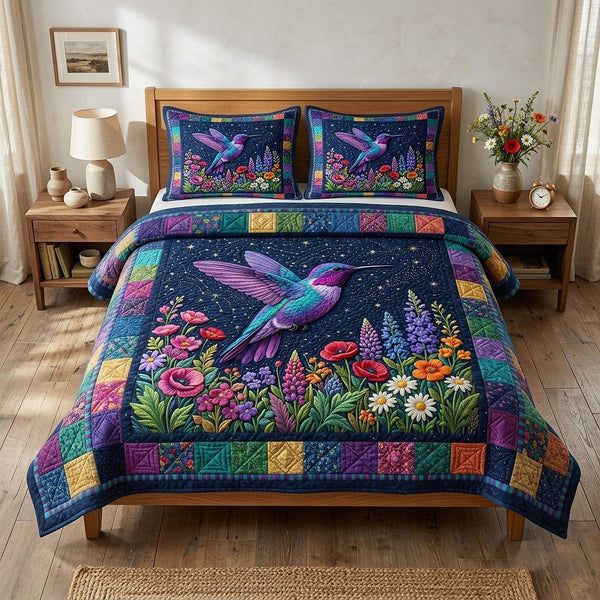 Garden Hover quilted 3-piece bedding set on a made bed with two matching pillow shams