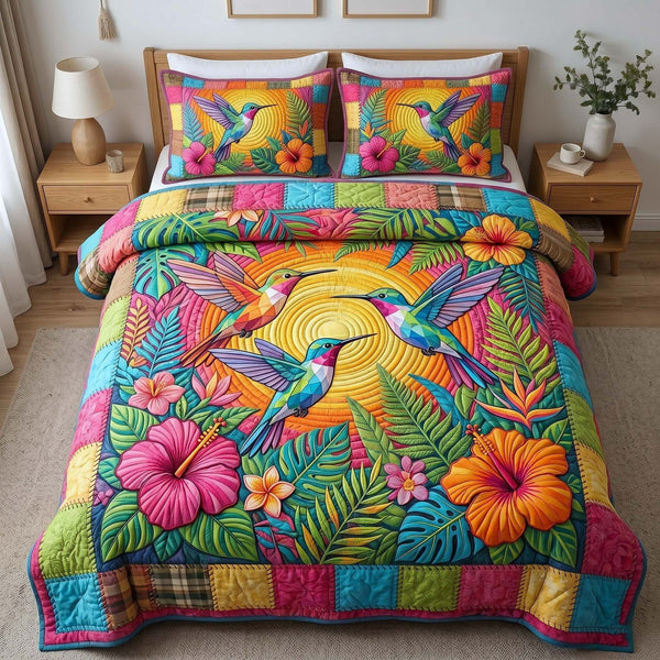 Garden Hummer quilted 3-piece bedding set on a made bed with two matching pillow shams