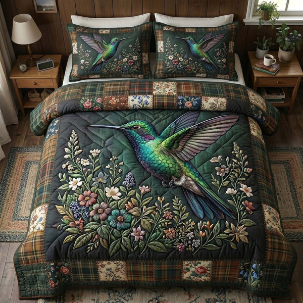 Garden Hummer quilted 3-piece bedding set on a made bed with two matching pillow shams
