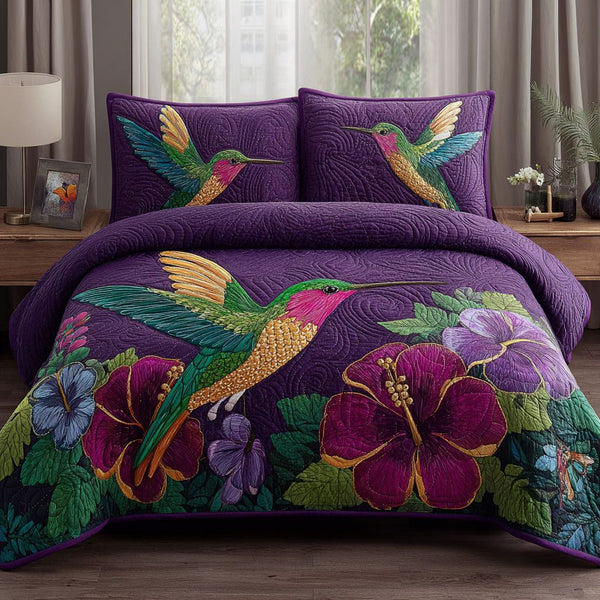 Garden Jewel quilted 3-piece bedding set on a made bed with two matching pillow shams