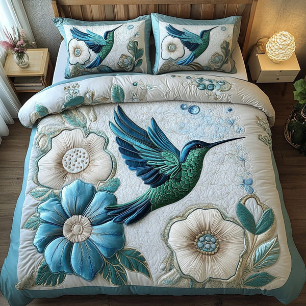 Garden Jewel quilted 3-piece bedding set on a made bed with two matching pillow shams