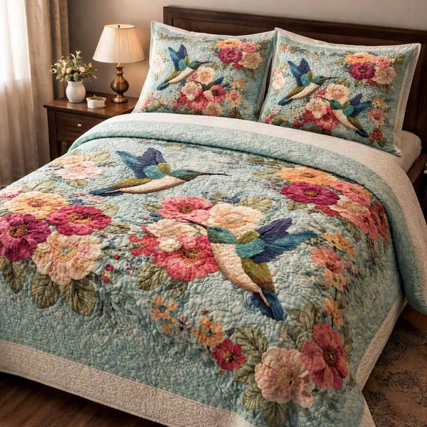 Garden Melody quilted 3-piece bedding set on a made bed with two matching pillow shams