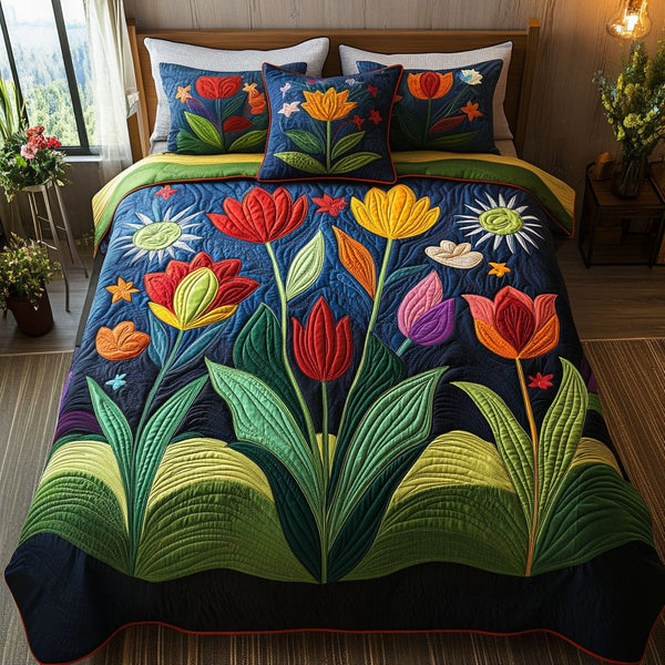 Garden of Colors quilted 3-piece bedding set on a made bed with two matching pillow shams