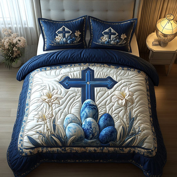 Garden Of Grace quilted 3-piece bedding set on a made bed with two matching pillow shams