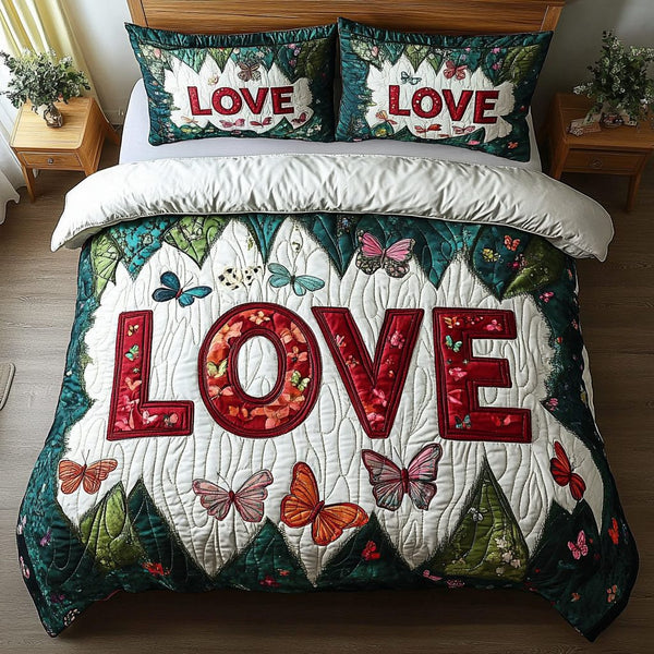 Garden of Love quilted 3-piece bedding set on a made bed with two matching pillow shams