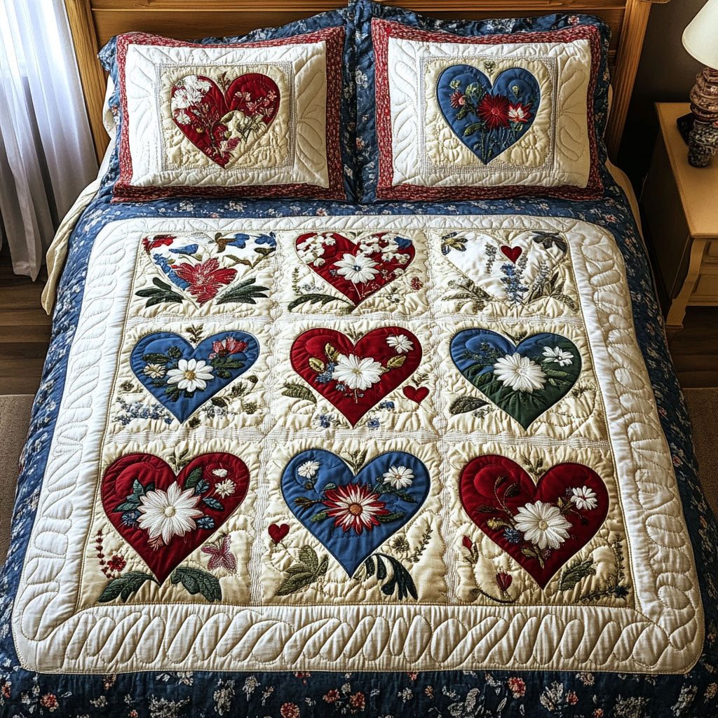 Garden of Love quilted 3-piece bedding set on a made bed with two matching pillow shams