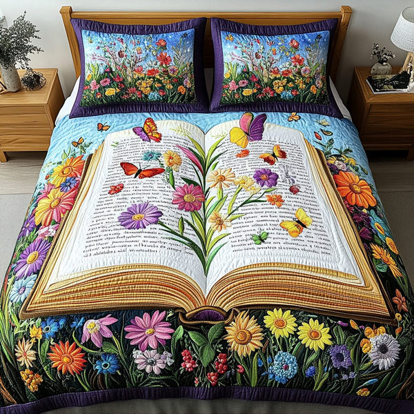 Garden of Words quilted 3-piece bedding set on a made bed with two matching pillow shams