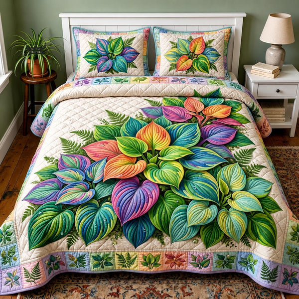 Garden Serenity quilted 3-piece bedding set on a made bed with two matching pillow shams