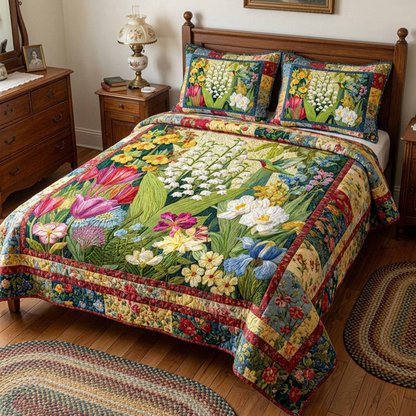 Garden Serenity quilted 3-piece bedding set on a made bed with two matching pillow shams