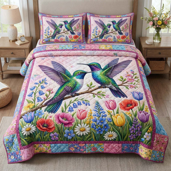 Garden Sprite quilted 3-piece bedding set on a made bed with two matching pillow shams