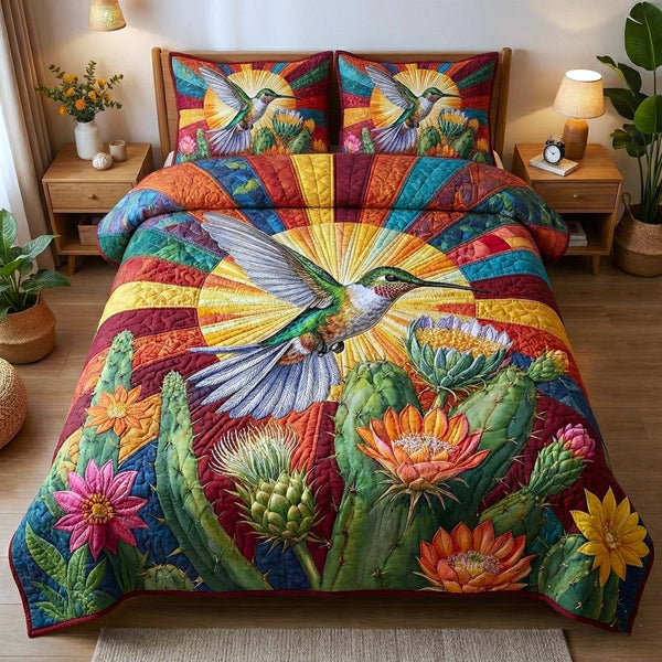 Garden Sprite quilted 3-piece bedding set on a made bed with two matching pillow shams
