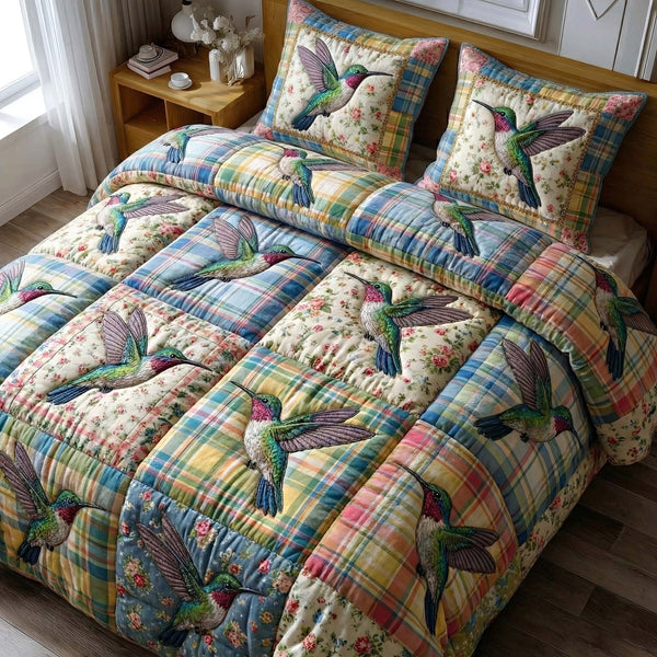 Garden Sprite quilted 3-piece bedding set on a made bed with two matching pillow shams