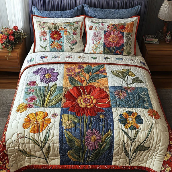 Garden Whimsy quilted 3-piece bedding set on a made bed with two matching pillow shams