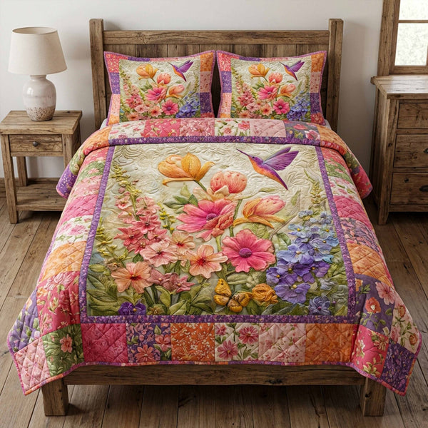 Garden Whispe quilted 3-piece bedding set on a made bed with two matching pillow shams