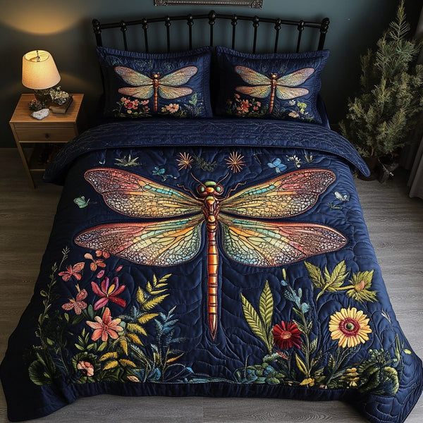 Garden Wings quilted 3-piece bedding set on a made bed with two matching pillow shams