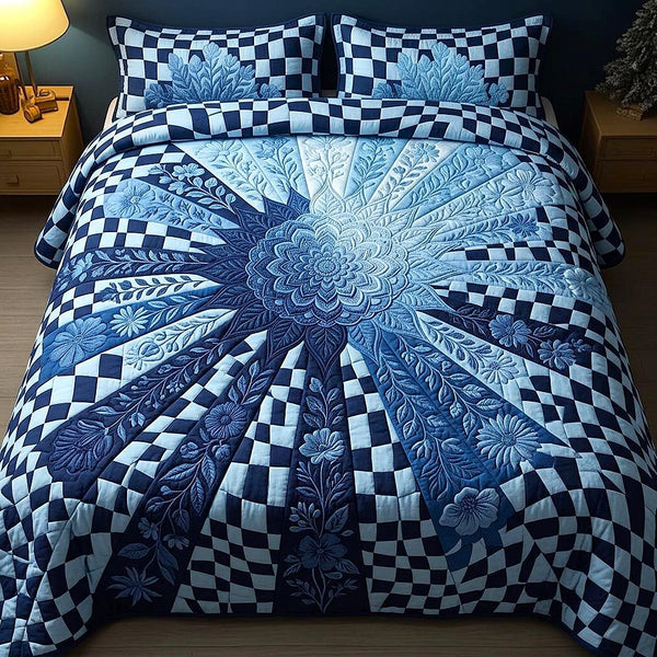 Gentle Bloom quilted 3-piece bedding set on a made bed with two matching pillow shams