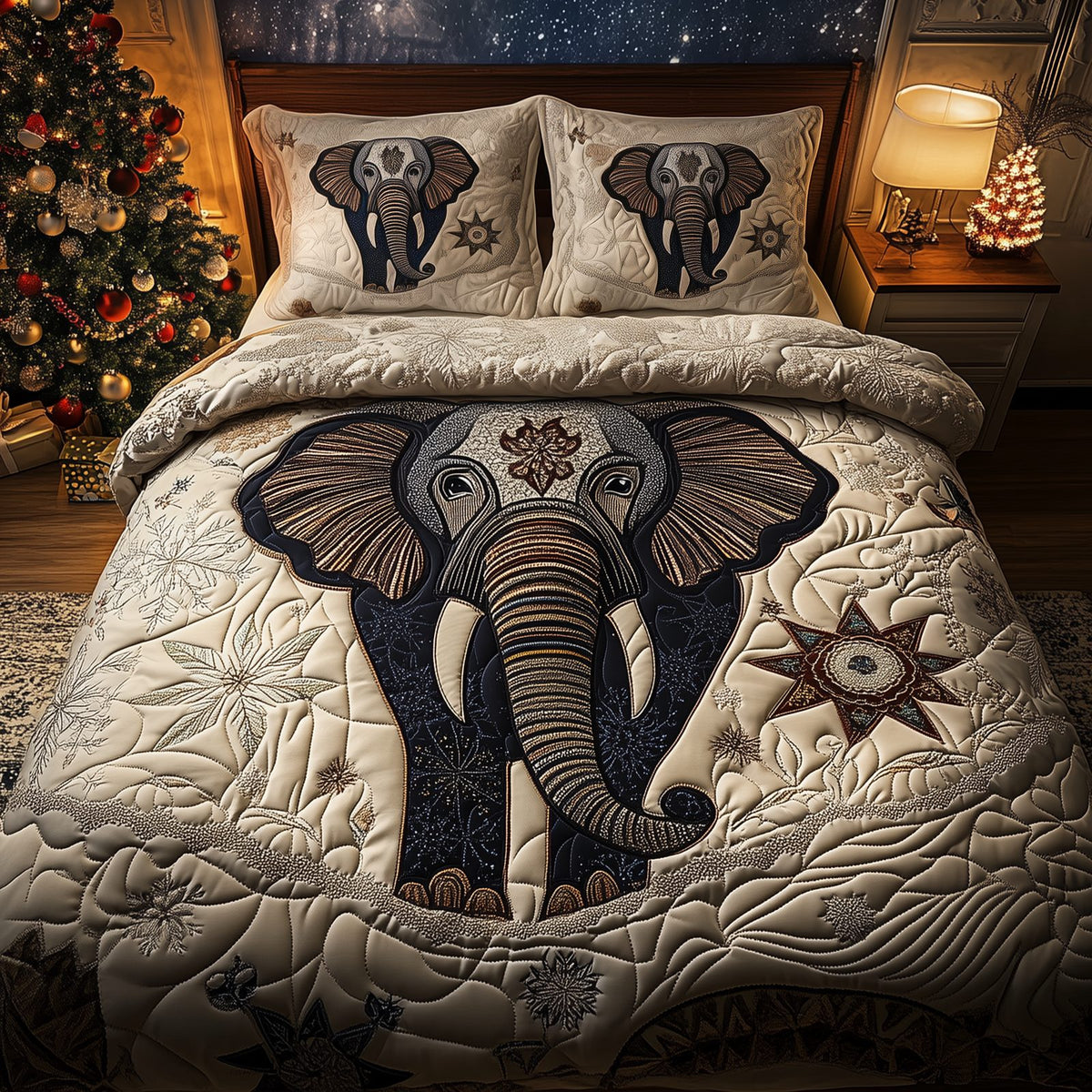 Gentle Elephant quilted 3-piece bedding set on a made bed with two matching pillow shams