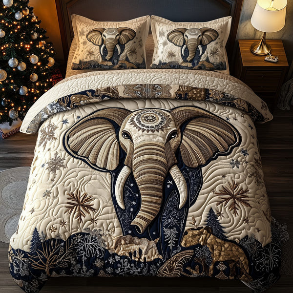 Gentle Elephant quilted 3-piece bedding set on a made bed with two matching pillow shams