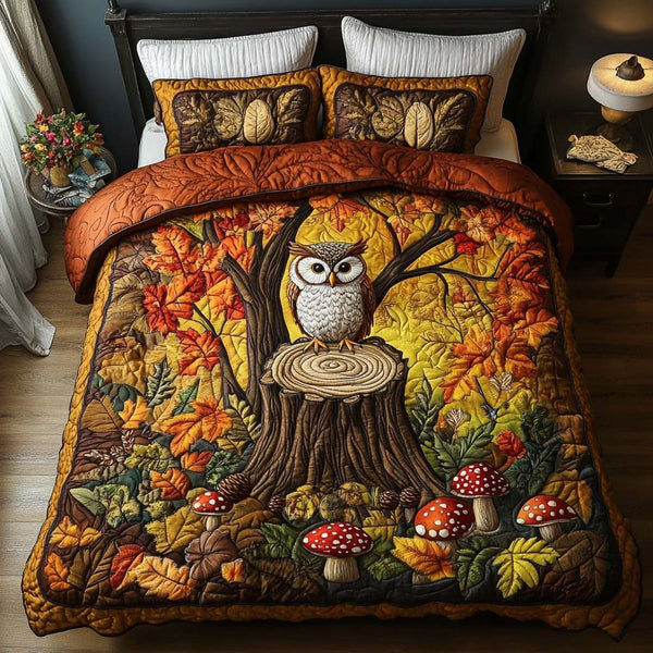 Gentle Forest Nest quilted 3-piece bedding set on a made bed with two matching pillow shams