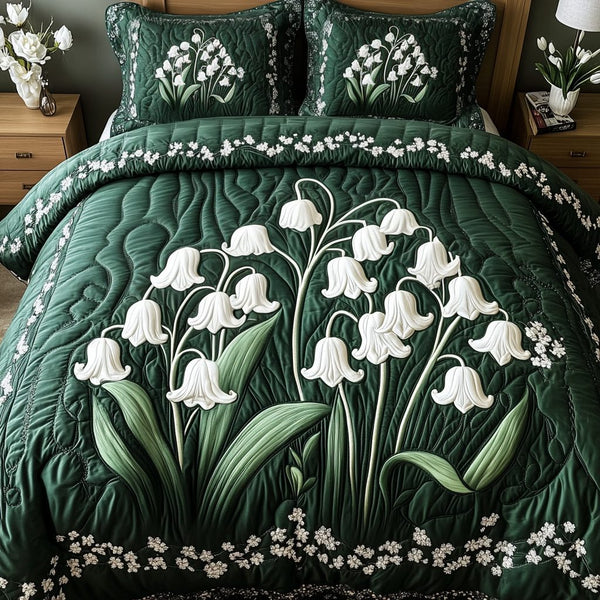 Gentle Garden quilted 3-piece bedding set on a made bed with two matching pillow shams