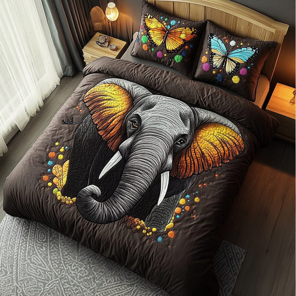Gentle Giant quilted 3-piece bedding set on a made bed with two matching pillow shams