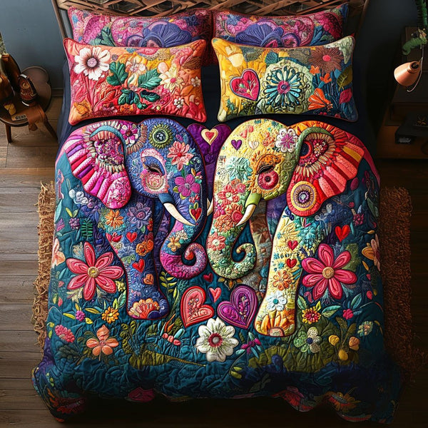 Gentle Giants of Love quilted 3-piece bedding set on a made bed with two matching pillow shams