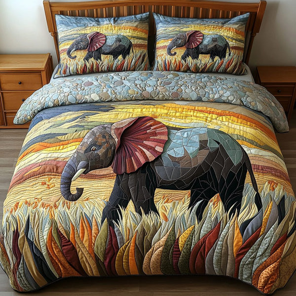 Gentle Giants quilted 3-piece bedding set on a made bed with two matching pillow shams