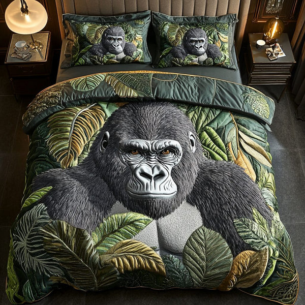Gentle Gorilla quilted 3-piece bedding set on a made bed with two matching pillow shams
