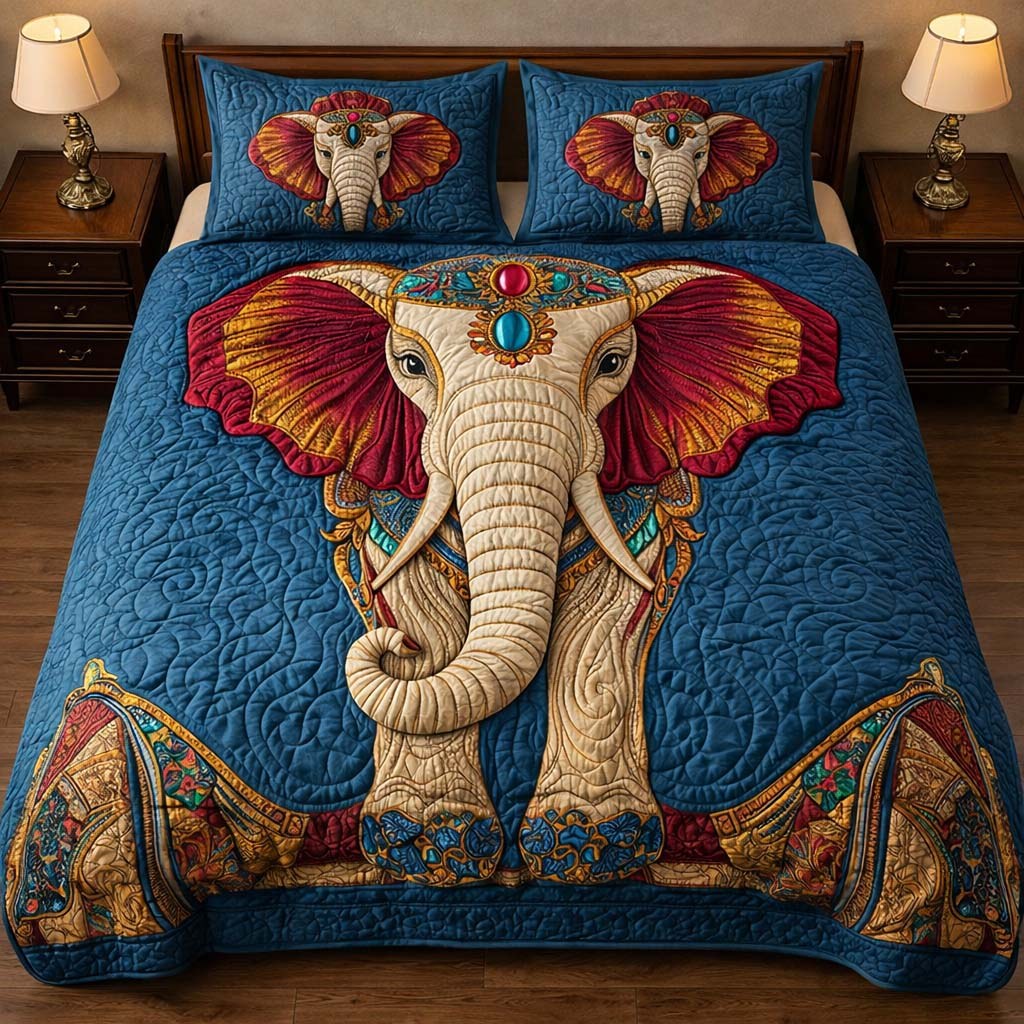 Gentle Jumbo quilted 3-piece bedding set on a made bed with two matching pillow shams