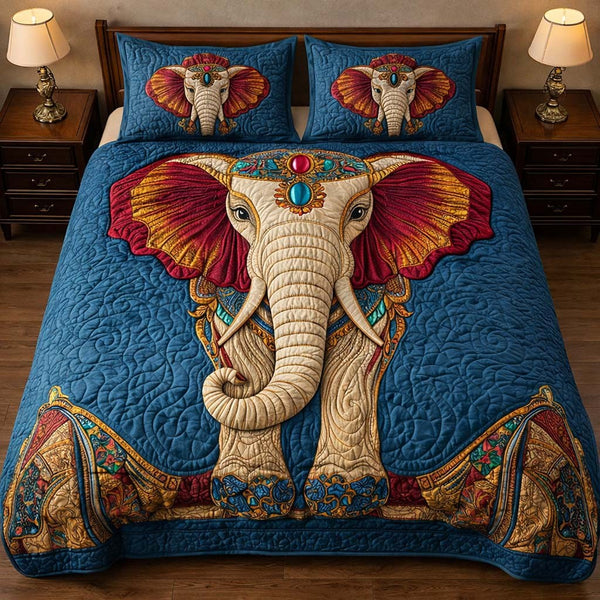 Gentle Jumbo quilted 3-piece bedding set on a made bed with two matching pillow shams