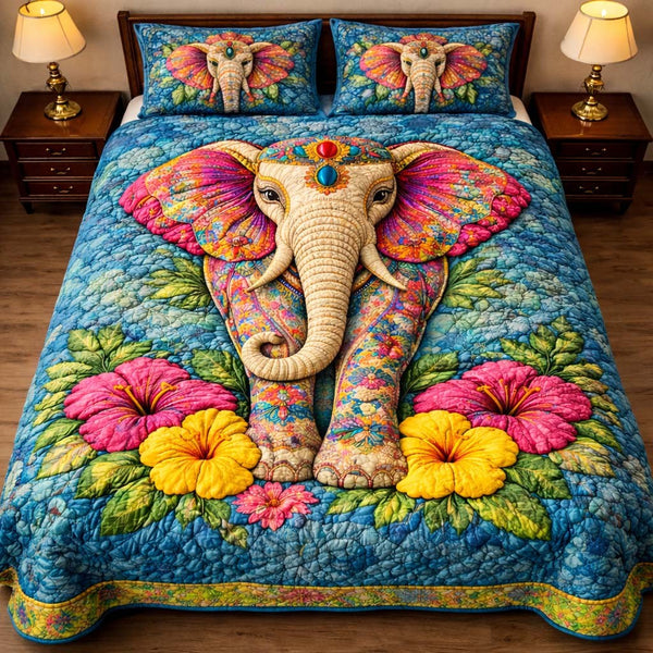 Gentle Jumbo quilted 3-piece bedding set on a made bed with two matching pillow shams
